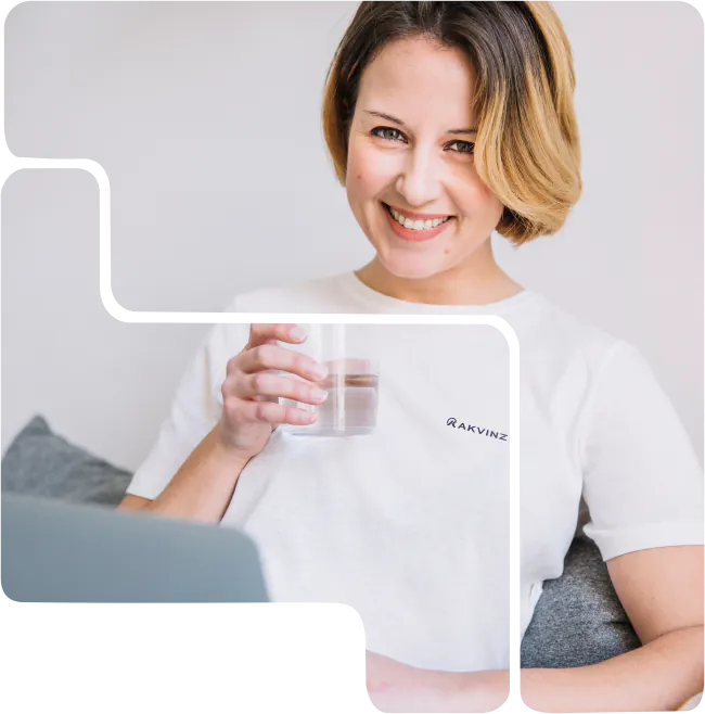 Woman enjoying a glass of Akvinz alkaline water